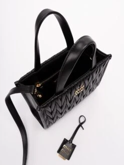 Miu Miu Tote Pelle Nappa -Negozio Di Abbigliamento Femminile 70cab1d2 3d06 4d3f 9af2 9ffe6f664852